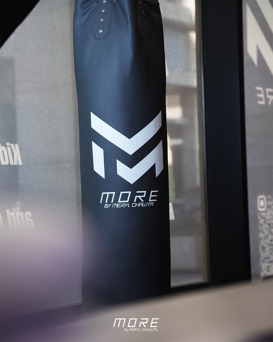 Heavy bag carrying the MORE mark
